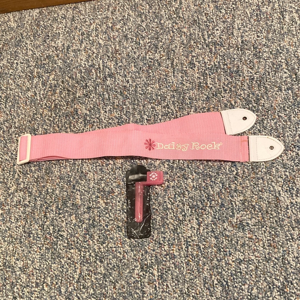 Daisy Rock Pink Guitar Strap and String Winding Tool
